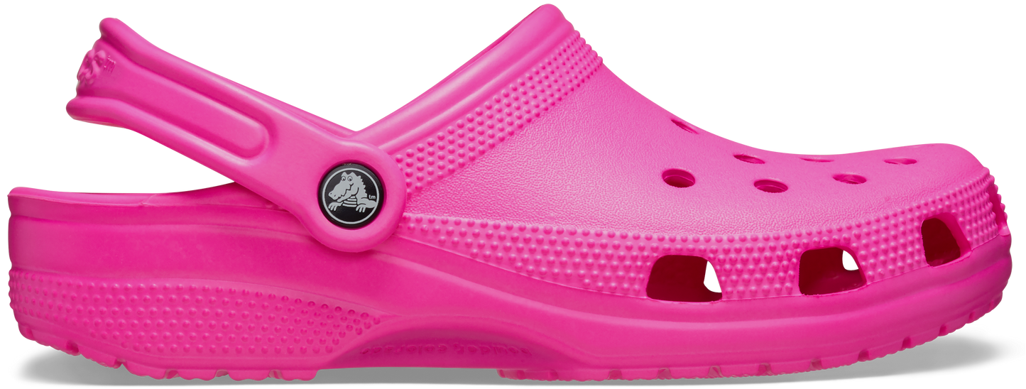 A pink Crocs Classic Clog with holes and a pivoting heel strap.