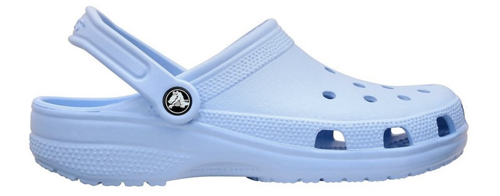 A single blue clog with a closed heel and multiple holes on the upper part.