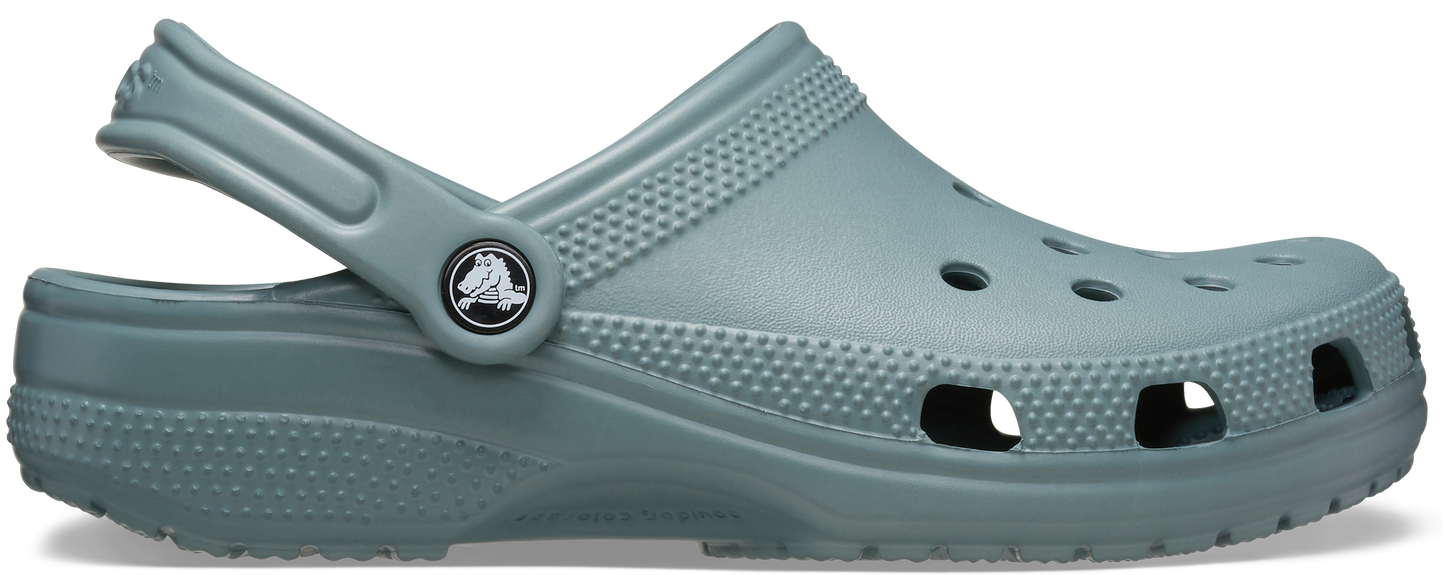 A single blue green classic clog with a pivoting heel strap and multiple holes for breathability.