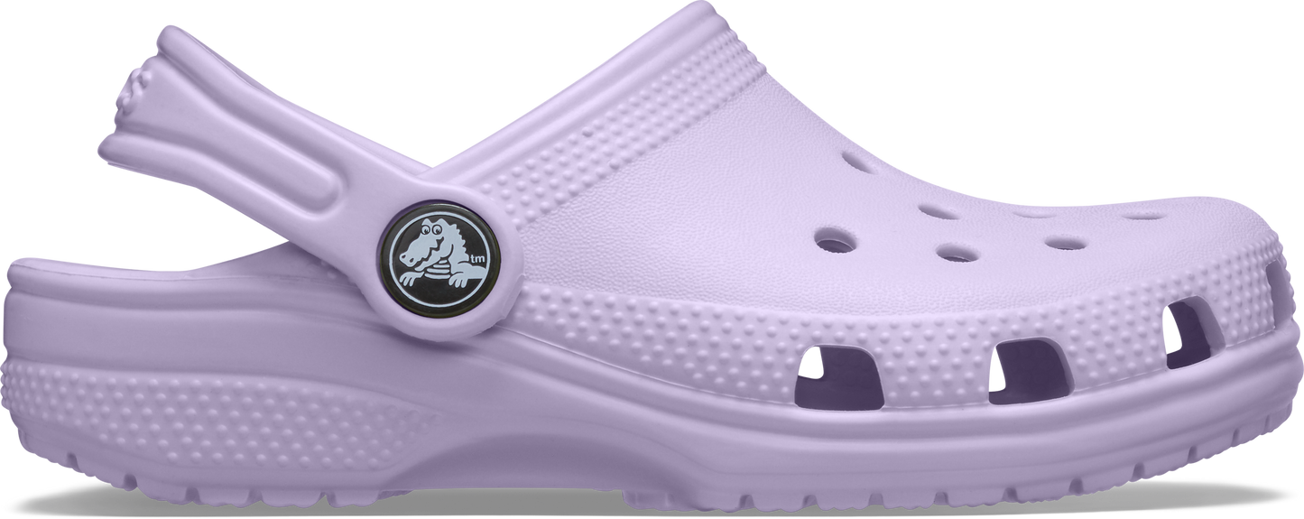 A lavender-colored Crocs Classic Clog for kids with a closed heel and open-toe design, featuring a lightweight and water-friendly material.
