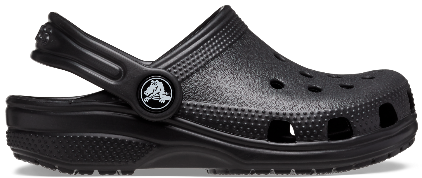 A black Iconic Crocs Classic Clog with a closed heel and the Crocs logo on the strap.