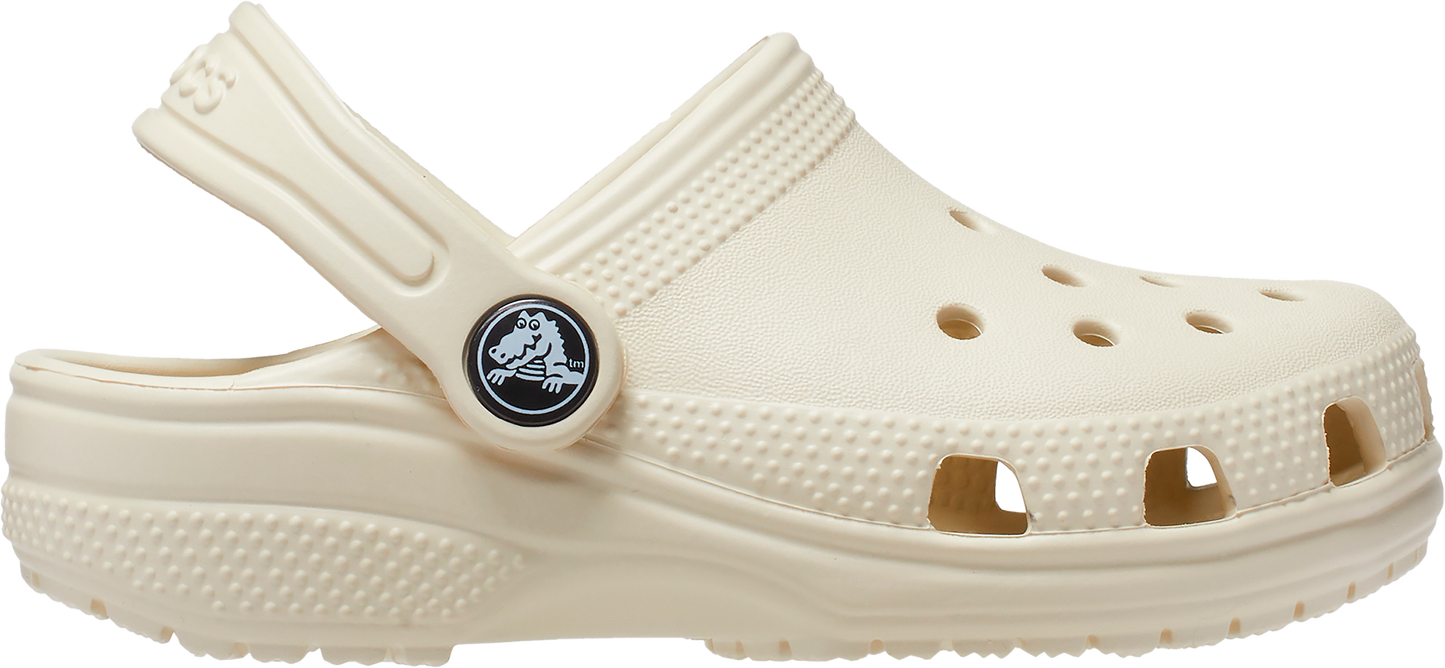 A pair of white Crocs Classic Clogs for toddlers with pivoting heel straps and a logo on the top.