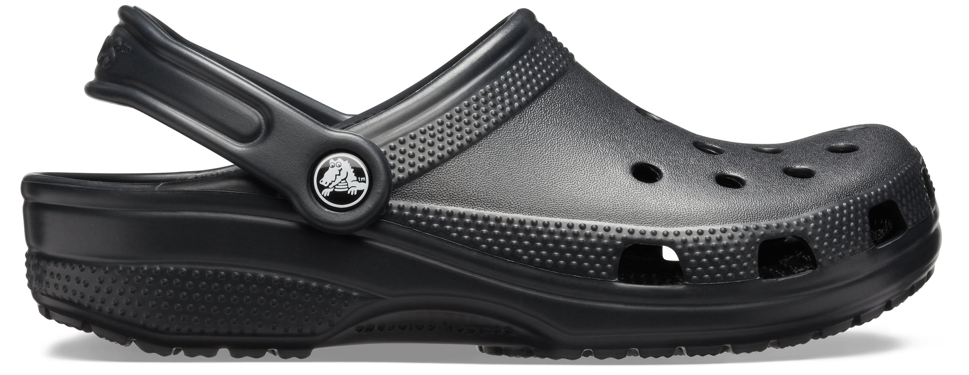 A single black Crocs Classic Clog for kids with a closed toe and pivoting heel strap.