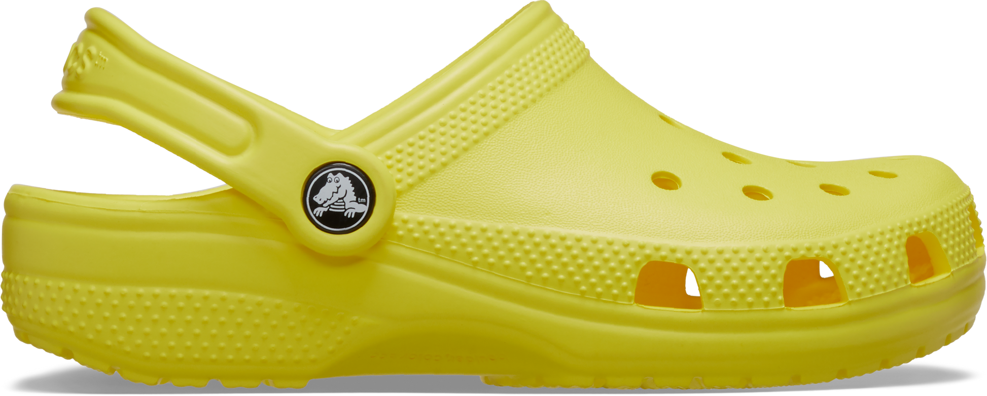 A single yellow kids' classic clog with a closed heel and an open toe design.