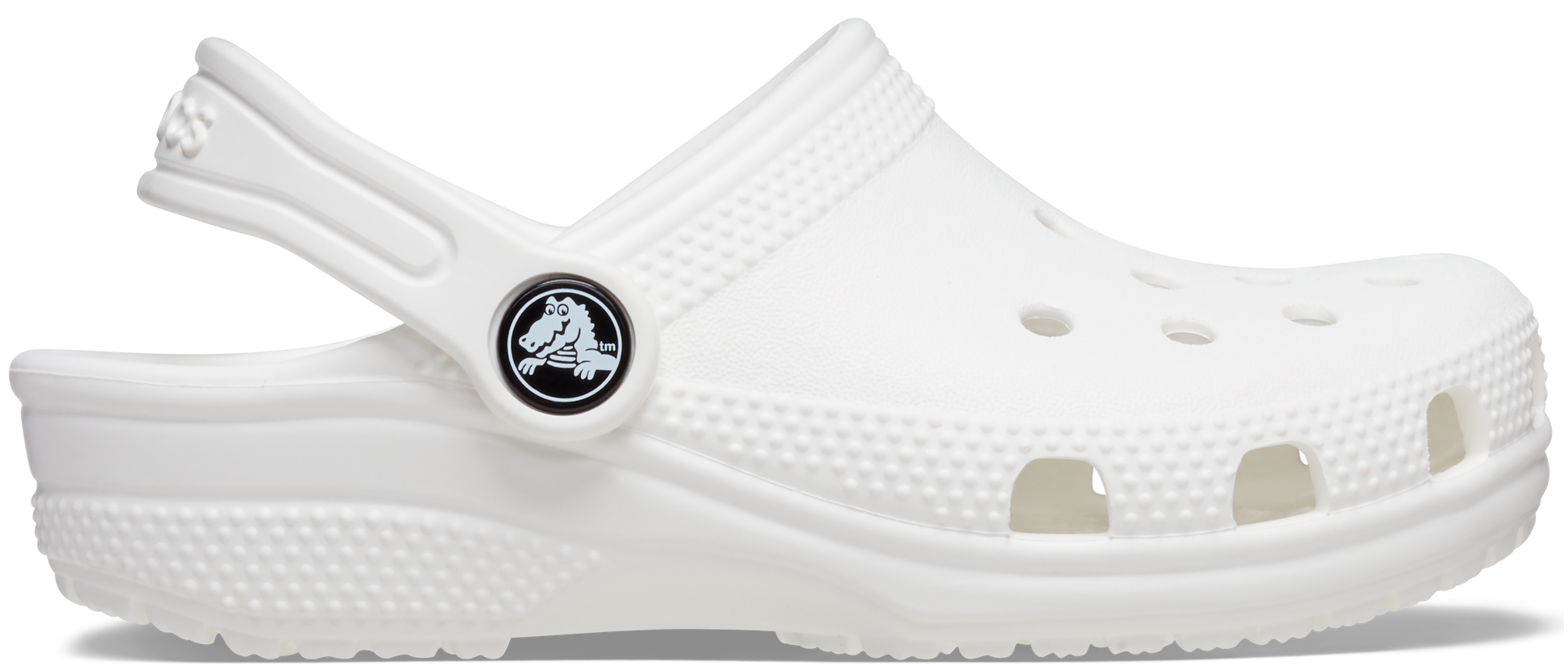 A white crocs classic clog for toddlers with a closed heel and an adjustable strap.